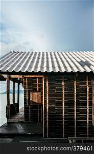 MAY 20, 2014 Koh Lanta , Krabi, Thailand - Old black wooden local ocean house in old town district of fisherman village in Koh Lanta. Famouse island destination