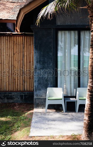 MAY 21, 2014 Krabi, THAILAND - Modern contemporary style chairs in garden balcony, Tropical outdoor resort relaxing space