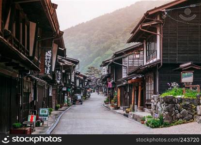 MAY 29, 2013 Nagano, Japan - Old wooden house and narrow street of Narai Post town (Narai-Juku) the midpoint town on Nakasendo road, Edo period trading route between old Tokyo and Kyoto