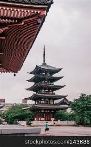 MAY 30, 2013 Nagoya, JAPAN - Japanese Five Storey pagoda place for kept Buddha holy ash was sent as a gift to Japan by King Chulalongkorn or King Rama V of Siam (Thailand)  symbol of friendship between two countries