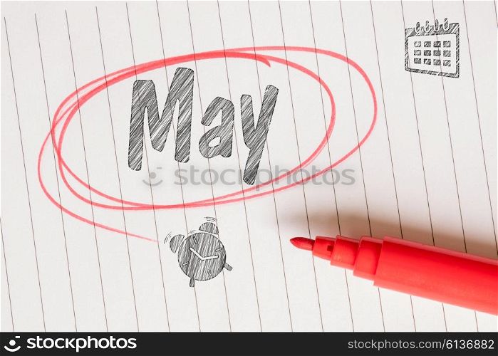 May memo note on paper with a red marker