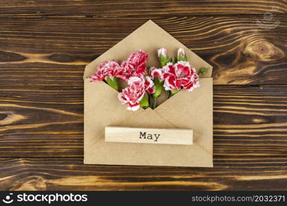 may text wooden block envelope with red carnation flowers