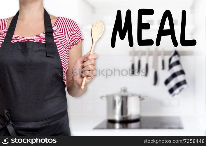 meal cook holding wooden spoon background.. meal cook holding wooden spoon background