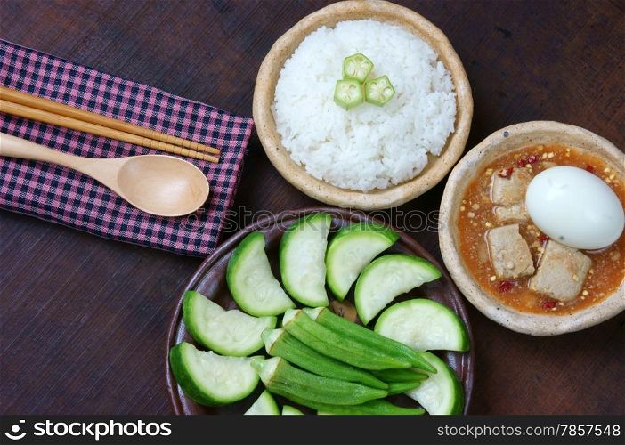 Meal for vegetarian with menu: bottle gourd, okra, egg, cooked rice, soya cheese. This Vietnamese food very delicious, nutrition, cholestorol free with organic, cheap ingredient and for diet people