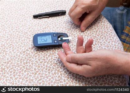 Measuring blood sugar on finger