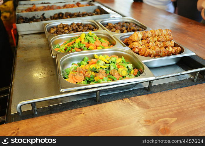 Meat and stewed vegetables in marmites