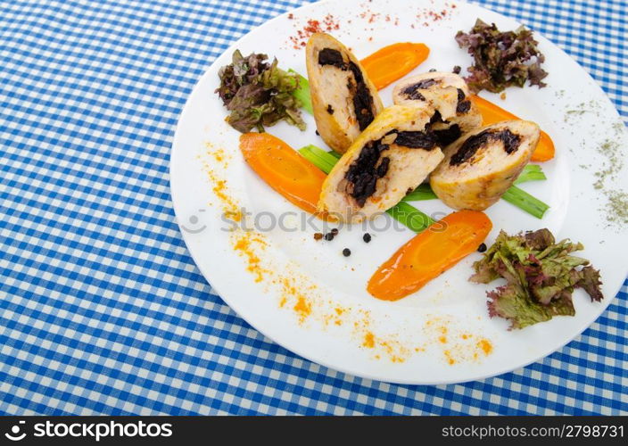 Meat and vegetable roll in plate