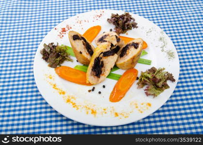 Meat and vegetable roll in plate