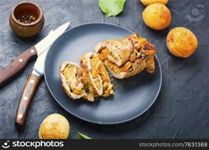 Meat baked in apricot sauce, summer meat dish.. Meat stuffed with apricot.