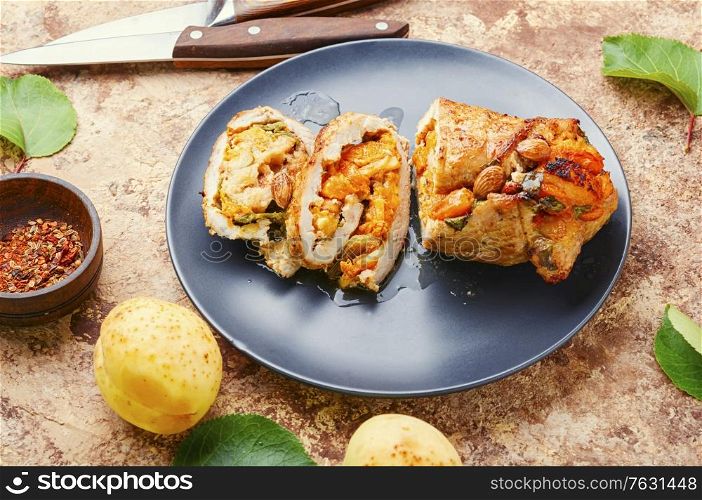 Meat baked in apricot sauce,summer meat food.Meat roulade. Meatloaf with apricot.