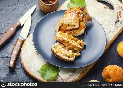 Meat baked in apricot sauce,summer meat food.Meat roulade. Meatloaf with apricot.