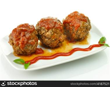 meat balls with tomato sauce on white dish