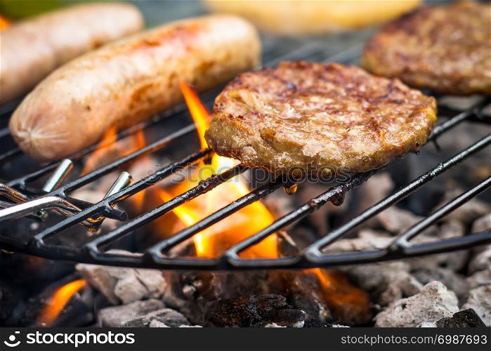 Meat cooking on a barbecue BBQ grill