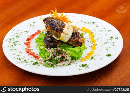 Meat cuisine - kebab served in plate