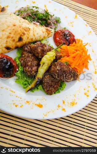 Meat cuisine - kebab served in plate