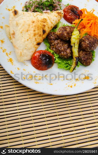 Meat cuisine - kebab served in plate