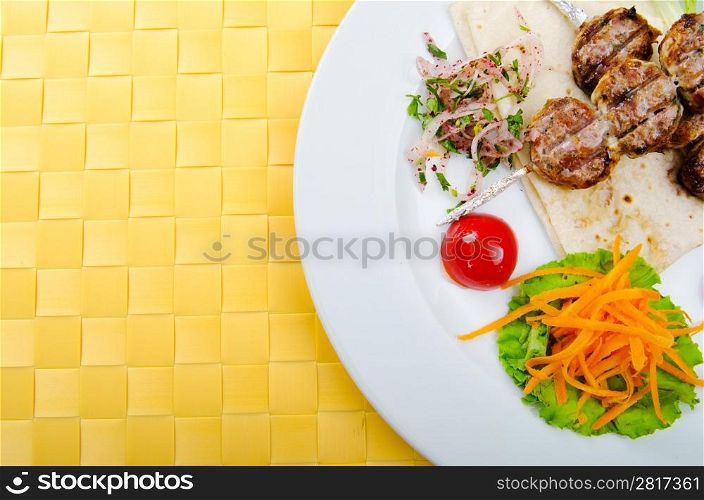 Meat cuisine - kebab served in plate