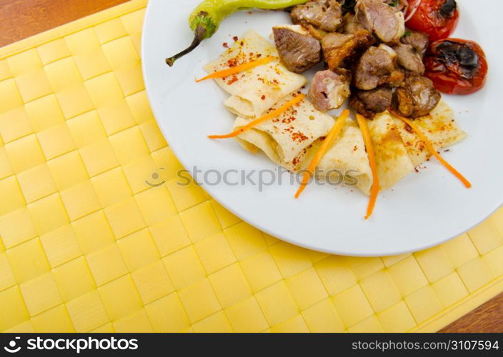 Meat cuisine - kebab served in plate