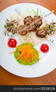 Meat cuisine - kebab served in plate