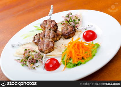 Meat cuisine - kebab served in plate