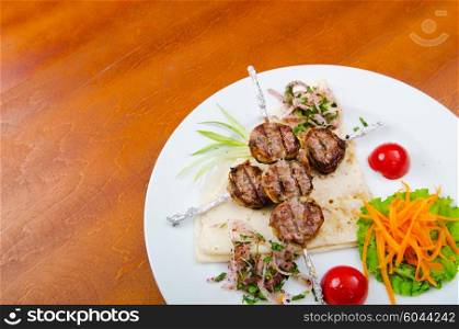 Meat cuisine - kebab served in plate