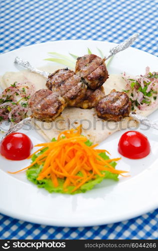 Meat cuisine - kebab served in plate