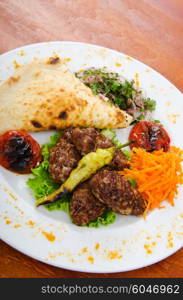 Meat cuisine - kebab served in plate