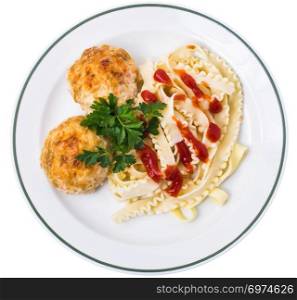 Meat cutlets with pasta and ketchup. Studio Photo. Meat cutlets with pasta and ketchup
