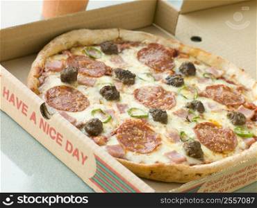 Meat Feast Pizza in a Take Away Box