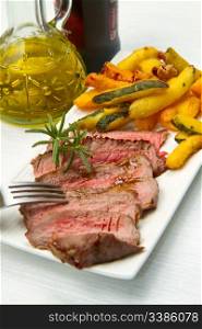meat grilled with fried vegetables