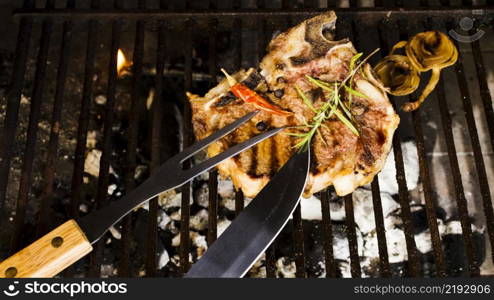 meat grilling with spices charcoals