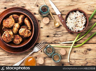 meat homemade cutlets. Homemade cutlets in clay ware on plate.Ukrainian home food