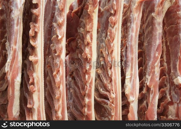 Meat in proces in a cold cut factory