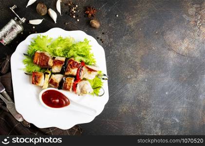 meat kebab with salad leaf and ketchup