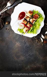 meat kebab with salad leaf and ketchup