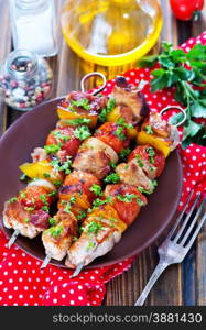 meat kebab with vegetables on the plate