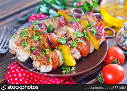 meat kebab with vegetables on the plate