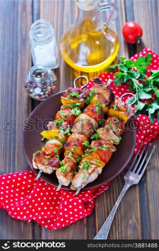 meat kebab with vegetables on the plate