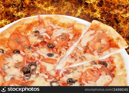 meat pizza closeup with carbonado ham, tomato, olive and mozzarella cheese