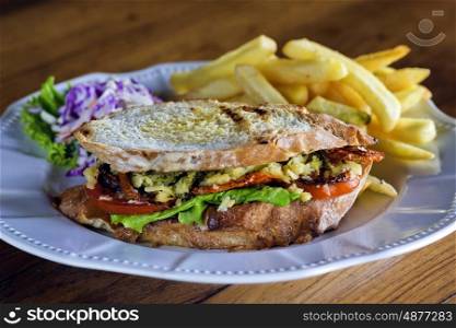 Meat sandwich with french fries