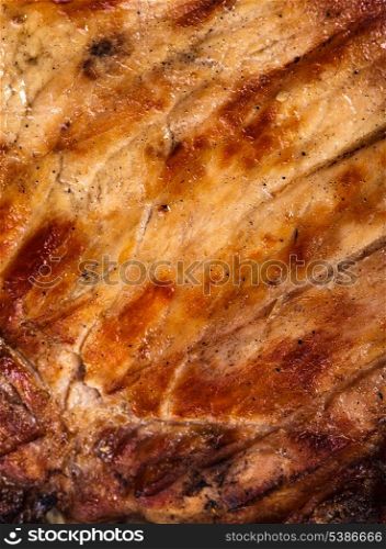 Meat steak roasted on grill as a backgroung