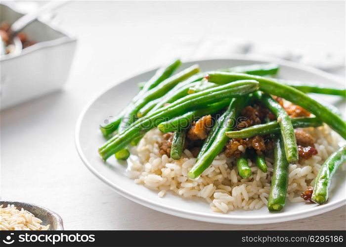 Meat with rice and green beans
