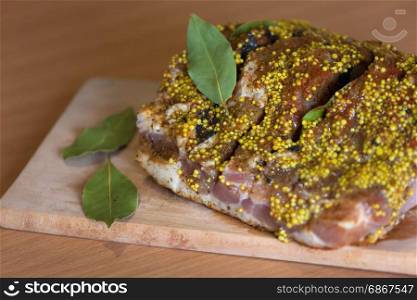 Meat with spices on the table