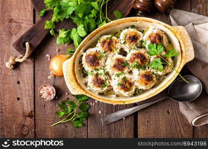 Meatballs baked in sour cream
