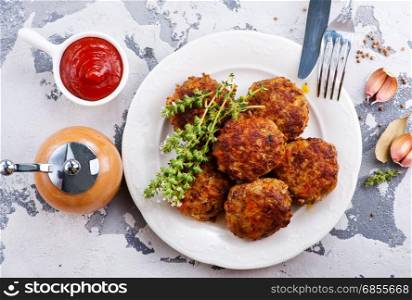 meatballs on plate and on a table