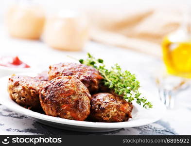 meatballs on plate and on a table