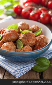 meatballs with tomato sauce in black pan