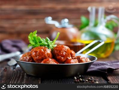 meatballs with tomato sauce in the pan