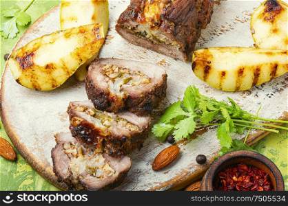 Meatloaf with pears and almonds.Beef meatloaf.Autumn food. Christmas meatloaf with fruit and nuts