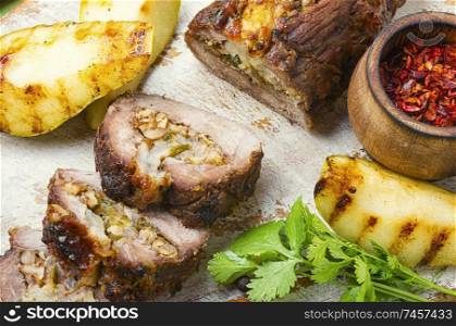 Meatloaf with pears and almonds.Beef meatloaf.Autumn food. Meatloaf with fruit and nuts